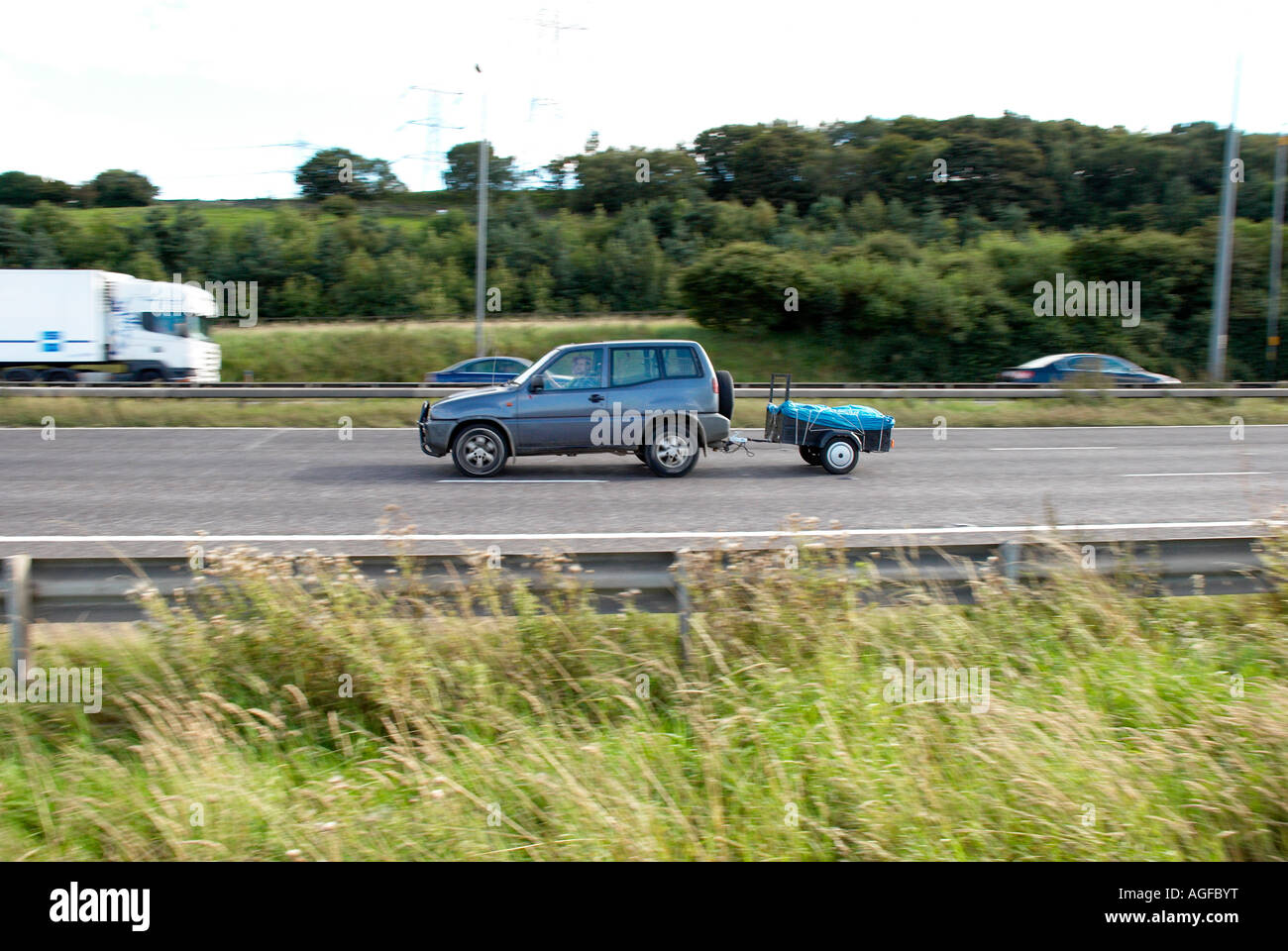 car towing a trailer Stock Photo Alamy
