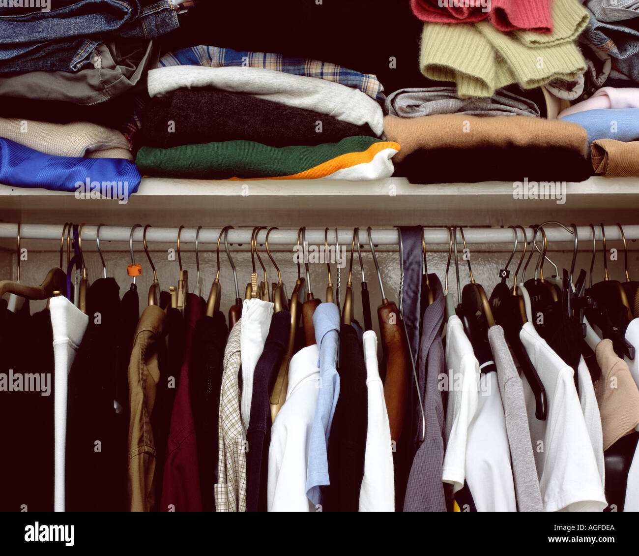 Clothes in cupboard Stock Photo Alamy