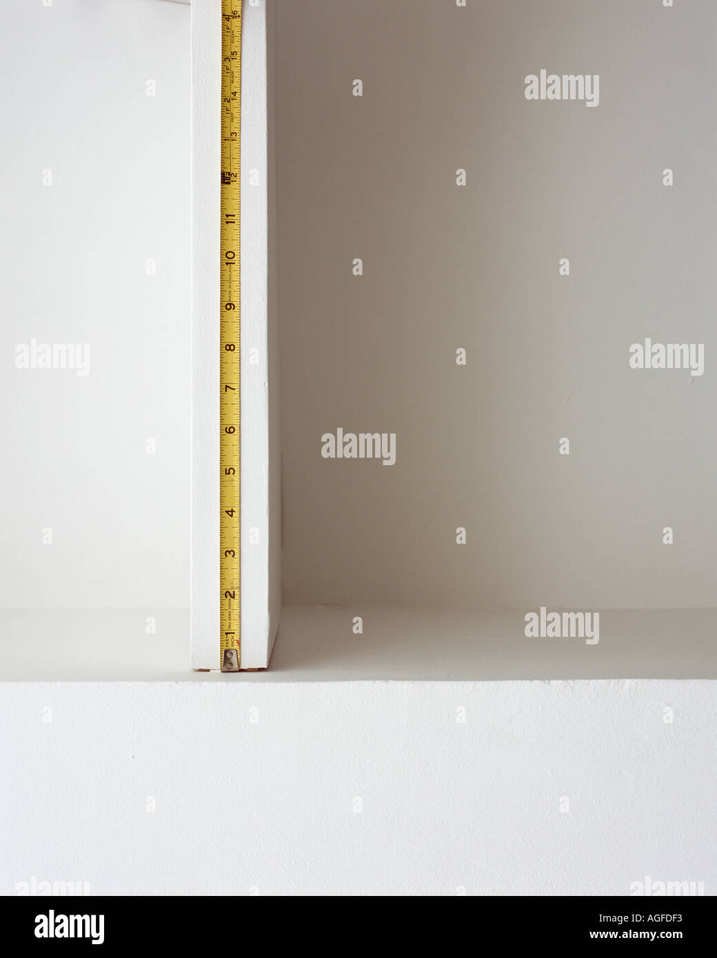 Tape measure on shelf space Stock Photo Alamy