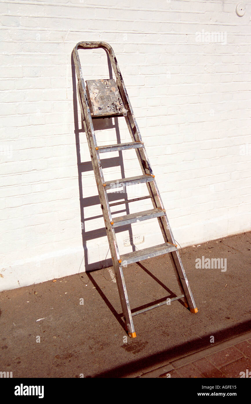 Folding stairs against wall deals