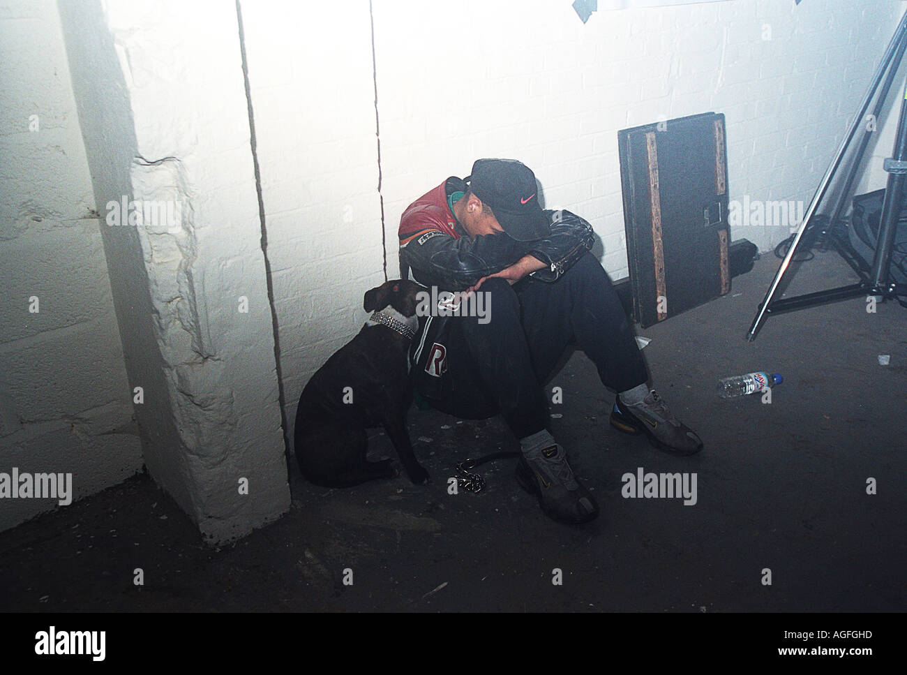 Sad man with dog Stock Photo