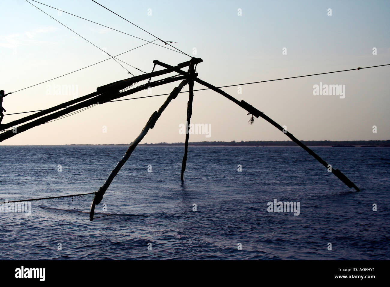 Close up of a chinese fishing net immersed in water Stock Photo