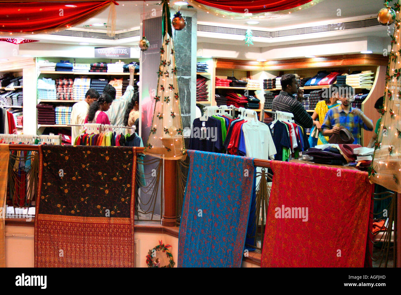 Interior of a busy textile shopping centre in Kerala, India during festival season Stock Photo