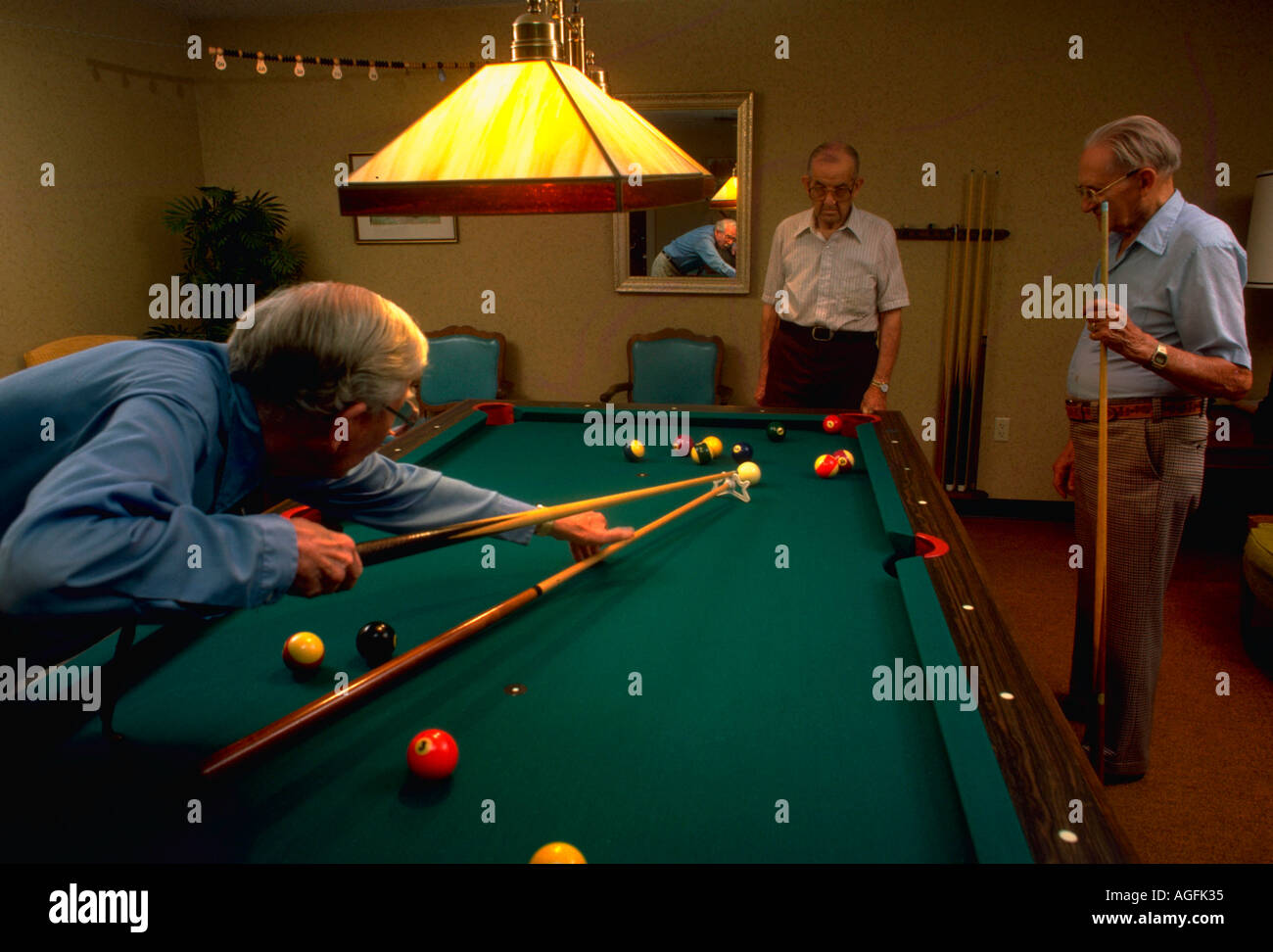SENIORS PLAYING POOL Stock Photo Alamy