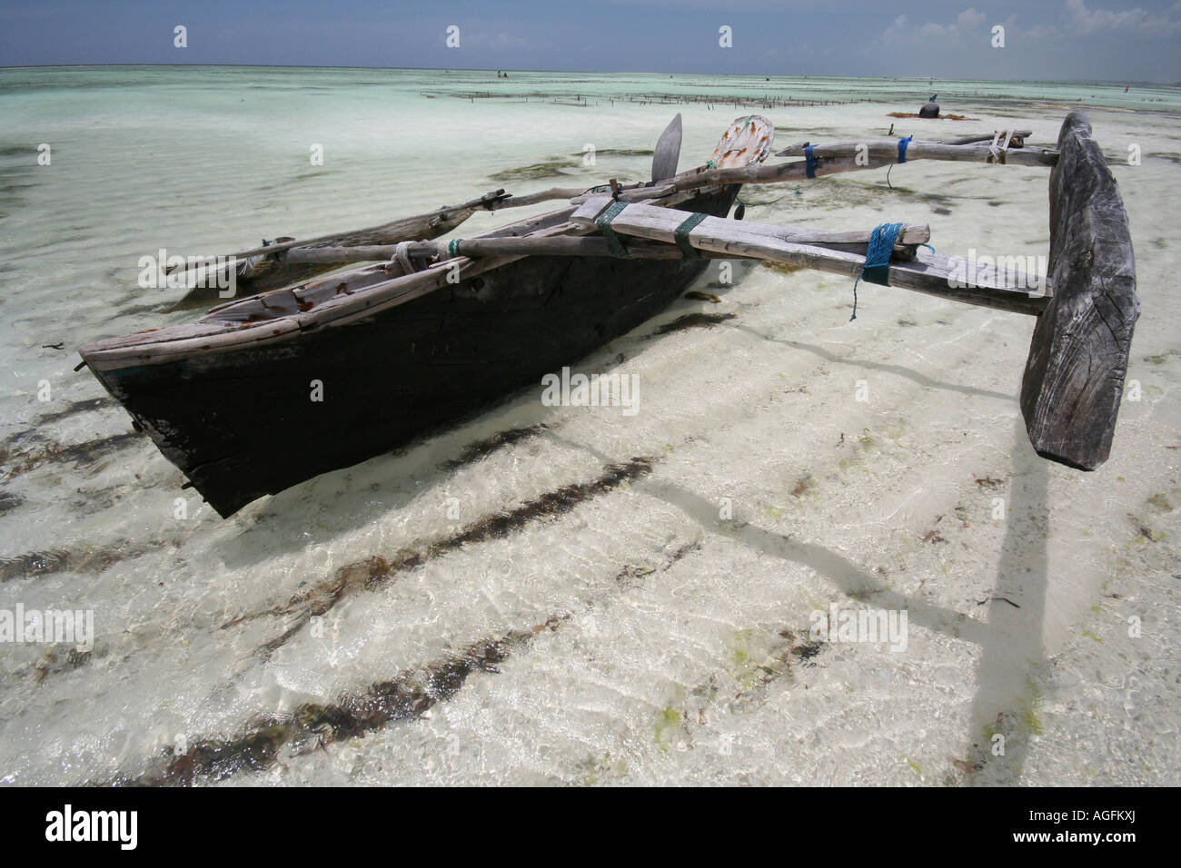 Zanzibari outrigger fishing canoe. Stock Photo