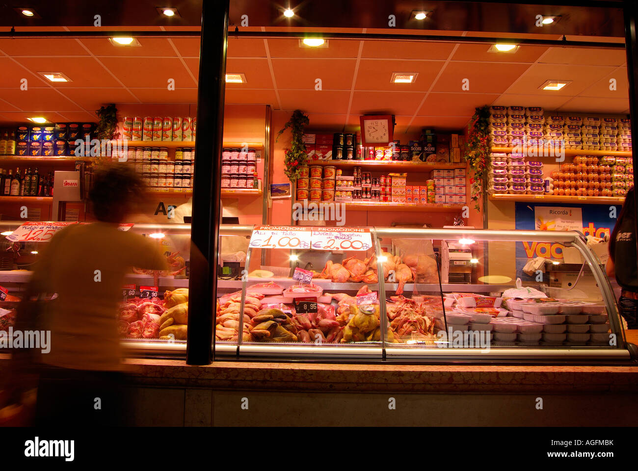 Fresh meat on display in the window of a butcher's shop in the food