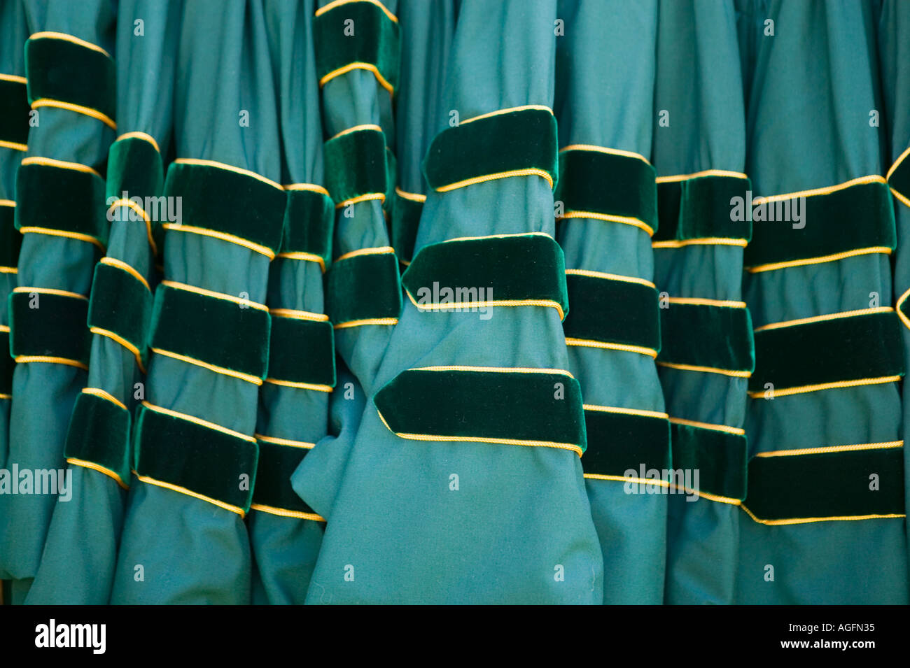 caps and gowns at a graduation Stock Photo - Alamy