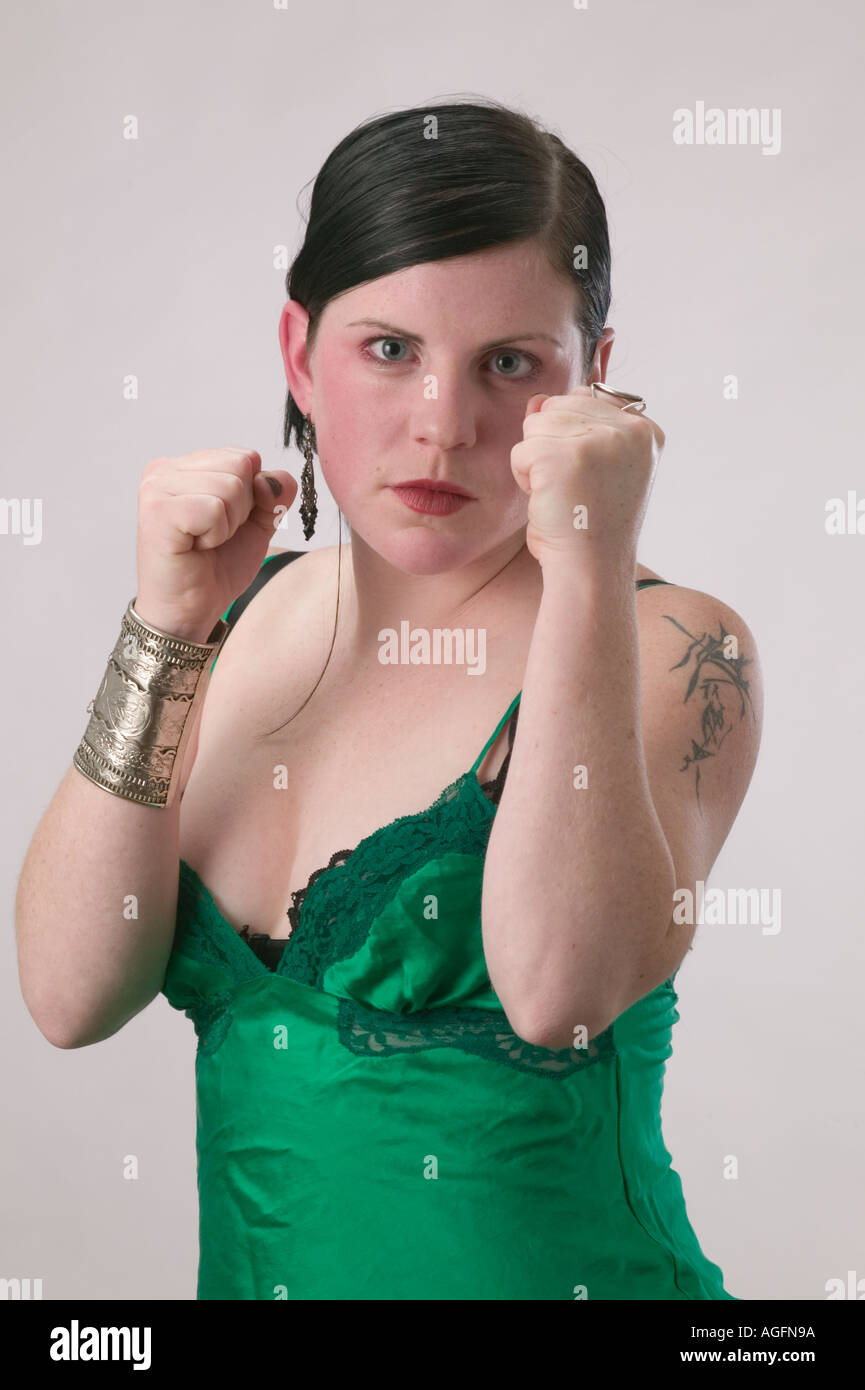 Woman in negligee shadow boxing Stock Photo