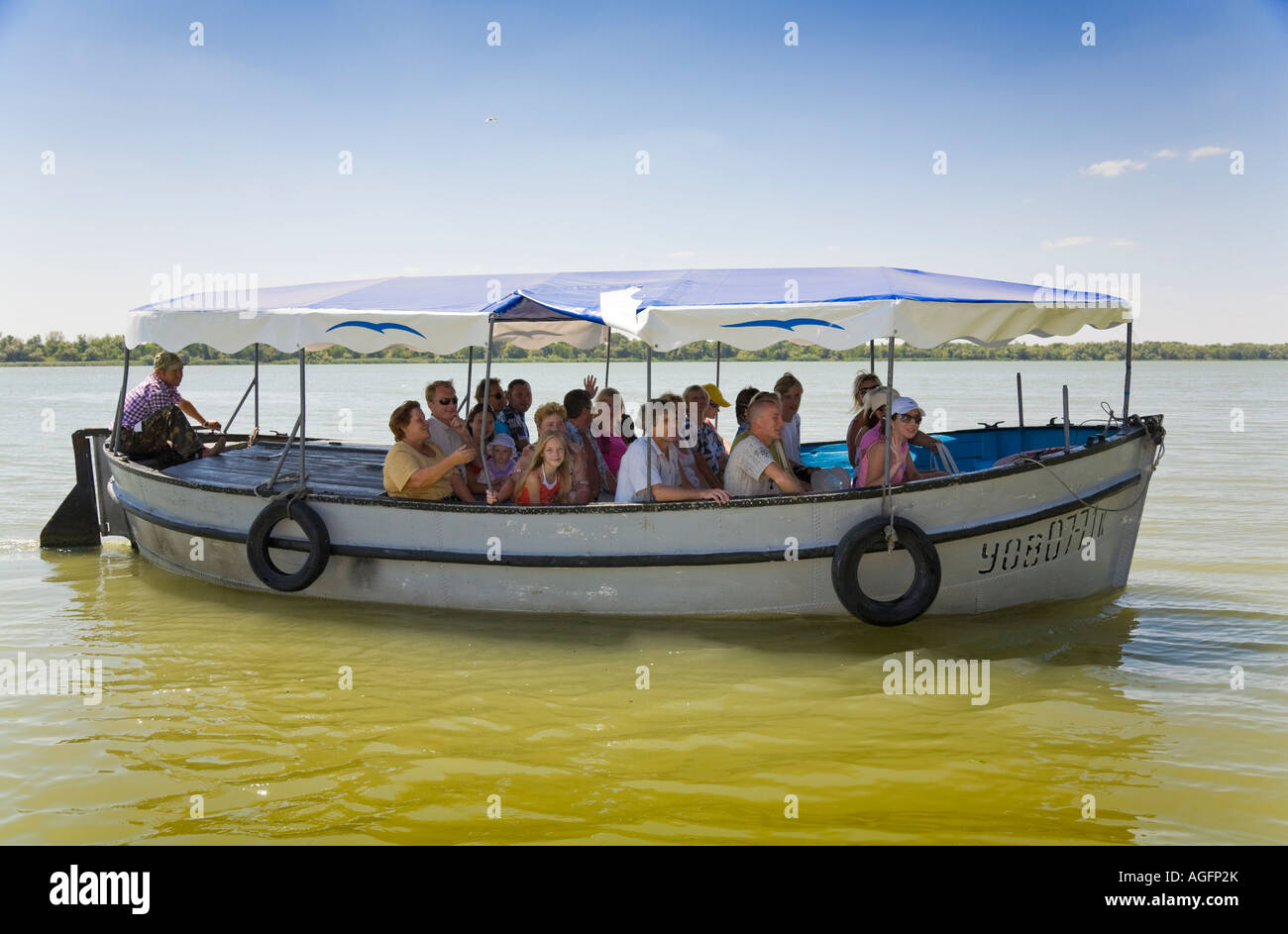 Tourists On A Boat Ride Through The Danube Delta Stock Photo Alamy Tourists On A Boat Ride Through The Danube Delta Stock Photo Alamy
