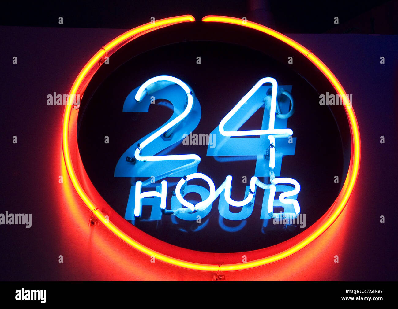 Neon 24 Hour sign in Las Vegas Airport Stock Photo