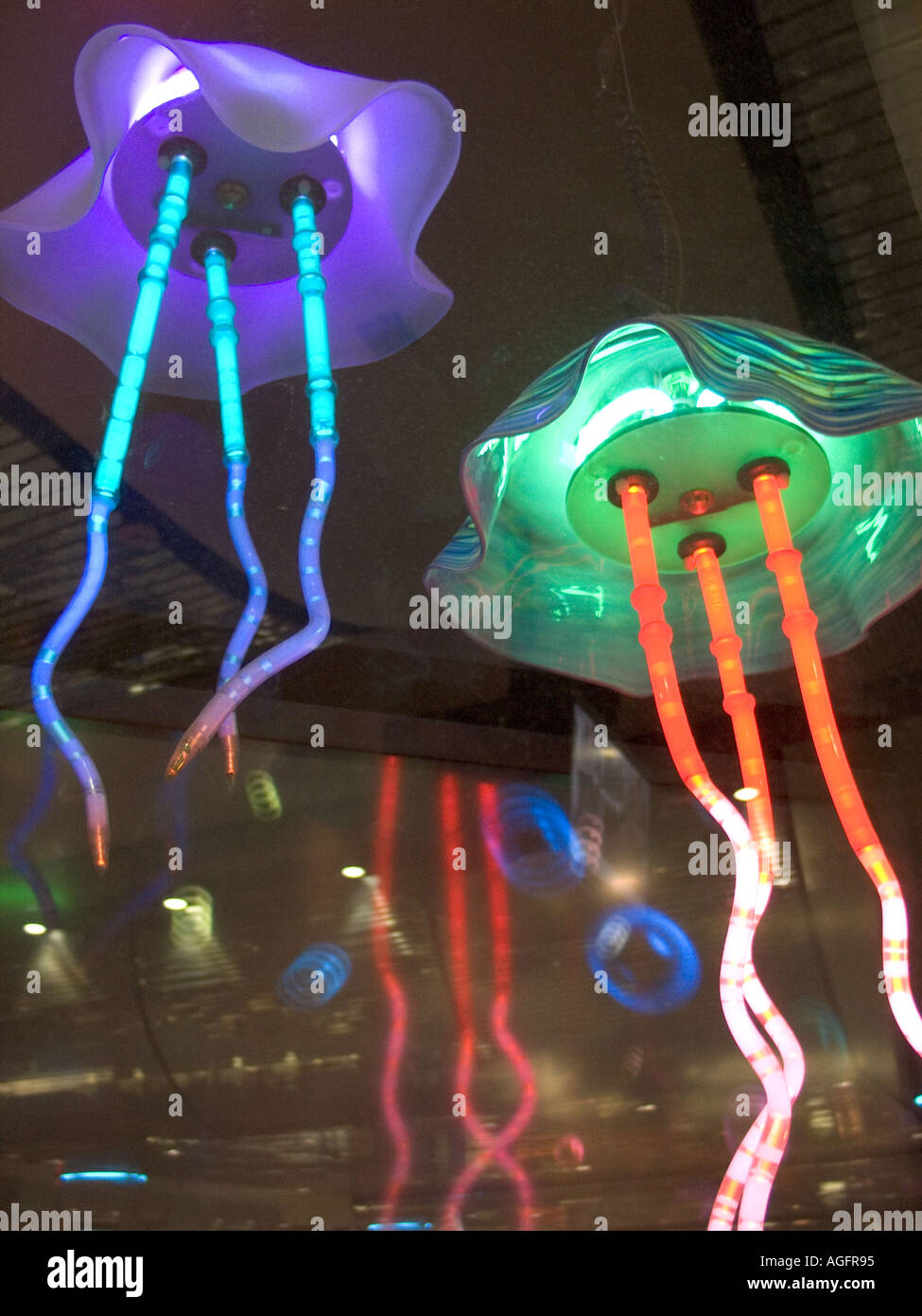 Neon jellyfish in a shop window at Las Vegas Airport Stock Photo Alamy