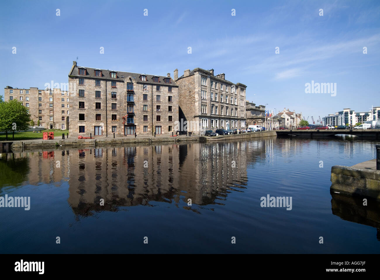 Buildings reflected in Water of Leith, Edinburgh, Scotland Stock Photo