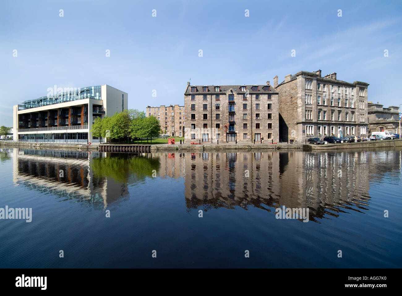 Buildings reflected in Water of Leith, Edinburgh, Scotland 2006 Stock Photo