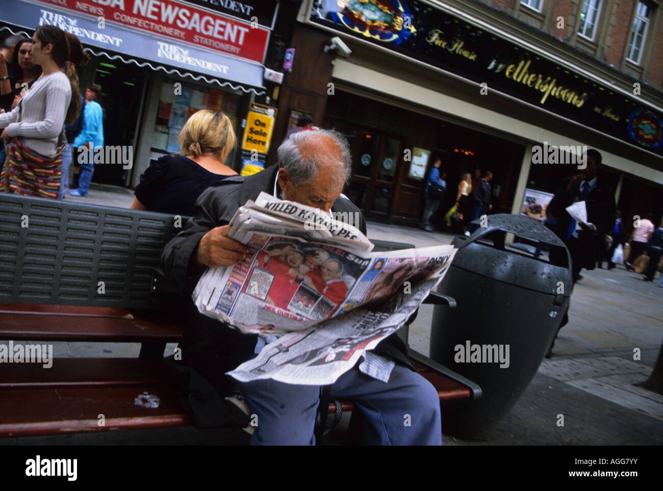 Man Reading Newspaper Stock Photo
