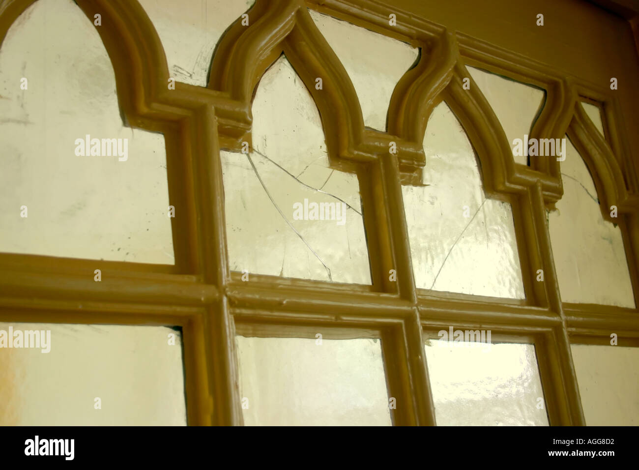 Ornate door with cracked glass Stock Photo