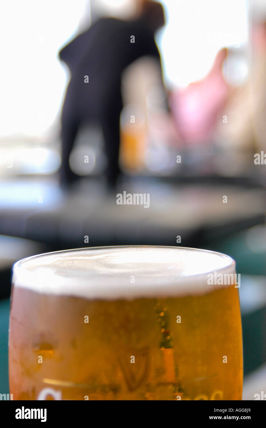 glass of beer at airport lounge Stock Photo Alamy