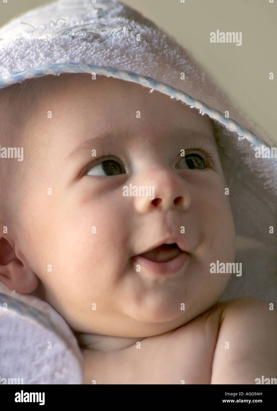 4 months old baby in a towel Stock Photo Alamy