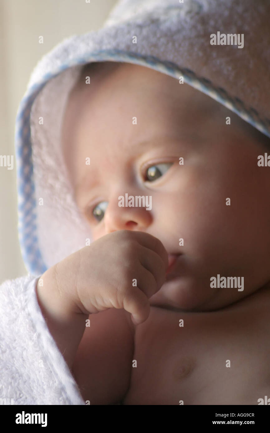 4 months old baby in a towel Stock Photo Alamy