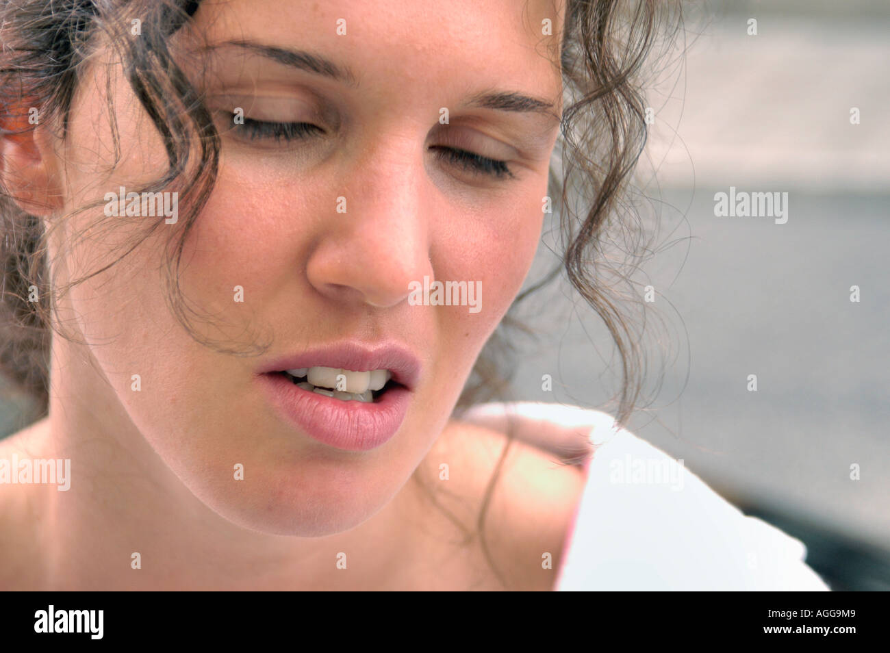 tired and unhappy woman having conversation Stock Photo
