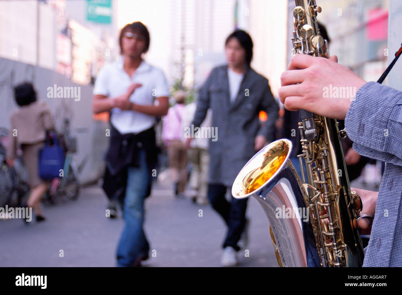 street entertainer with saxophone in Shinjuku, Tokyo, Japan Stock Photo