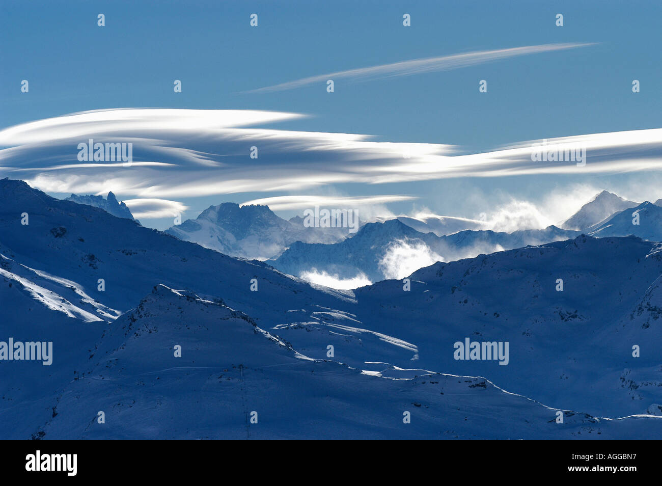 surreal cloud formation above mountain chain, Val Thorens, French Alps, France Stock Photo