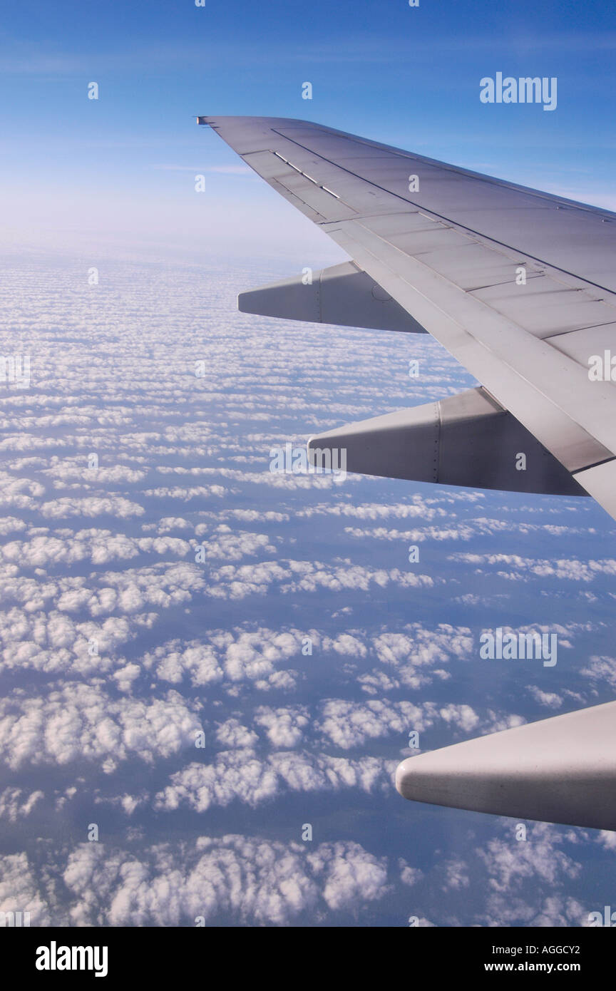 Airplane above clouds hi-res stock photography and images - Alamy