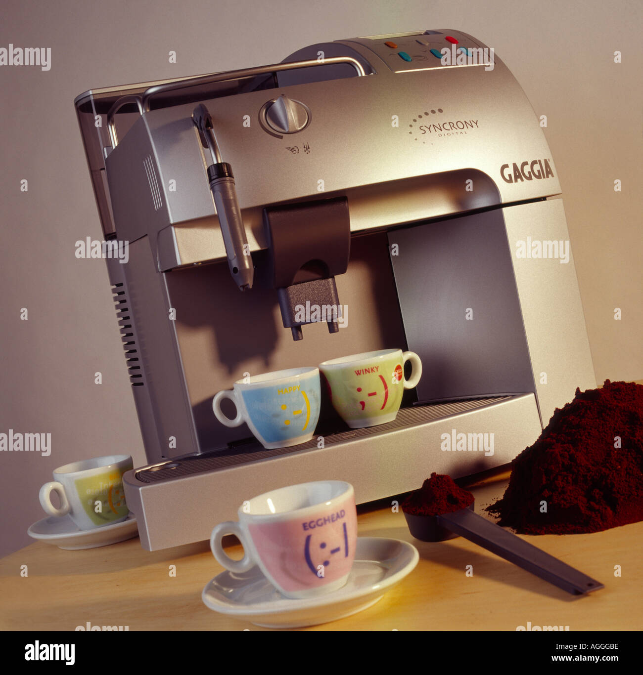 Coffee expresso machine with cups and fresh ground beans Stock Photo