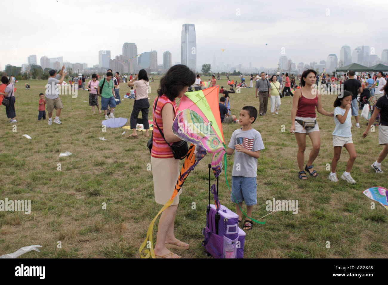 Mother and Son at Kite Festival in Liberty State Park across from