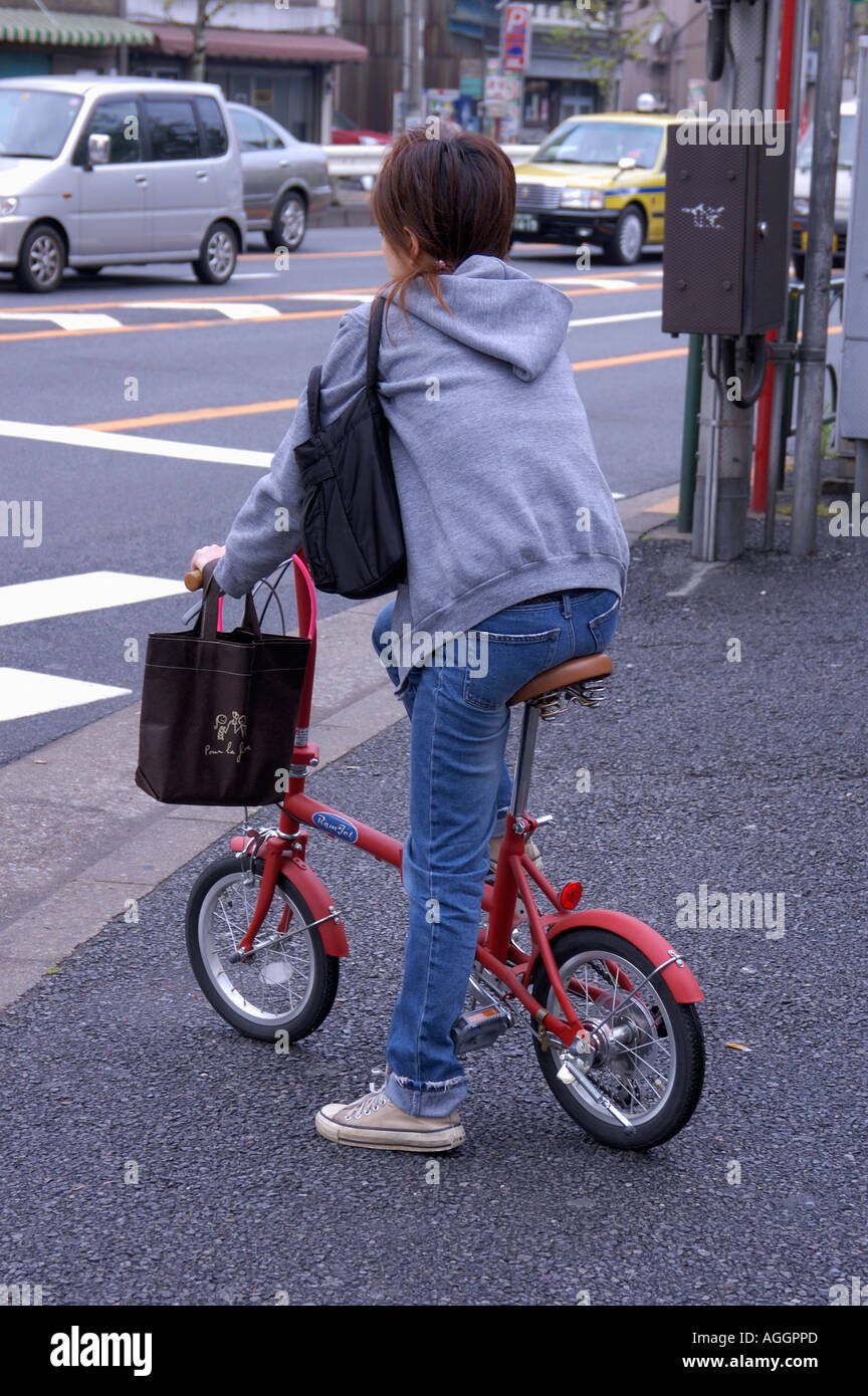 person on mini bike, Tokyo, Japan Stock Photo Alamy