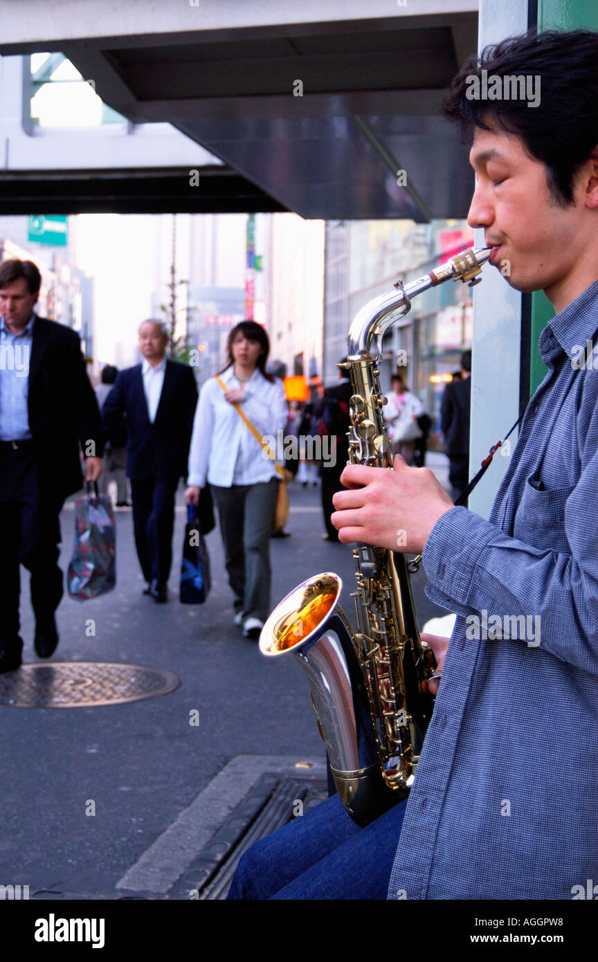 street entertainer with saxophone in Shinjuku, Tokyo, Japan Stock Photo