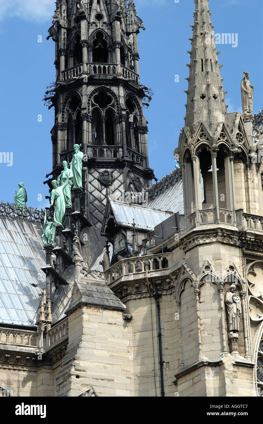 Early gothic spires and statues atop Notre Dame Cathedral Paris France ...