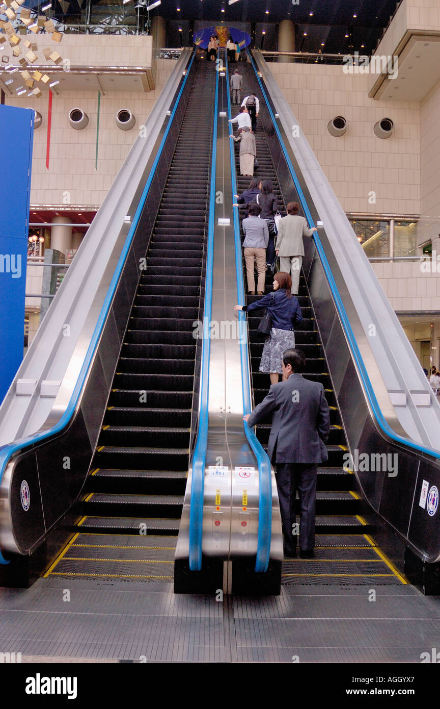commuters on world's longest escalator, Tokyo, Japan Stock