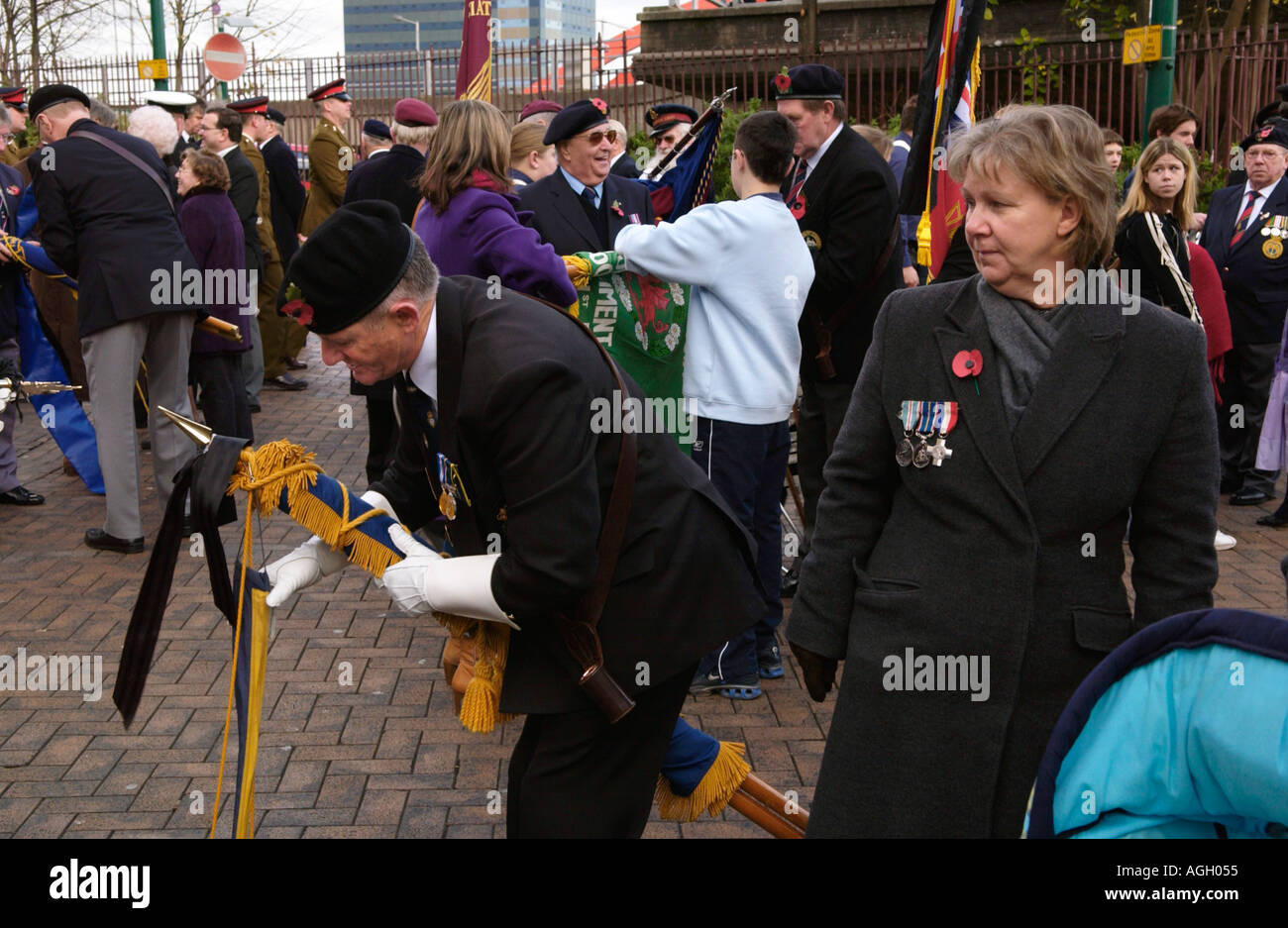 Remembrance Day parade veterans folding their banners in Newport South Wales UK Stock Photo