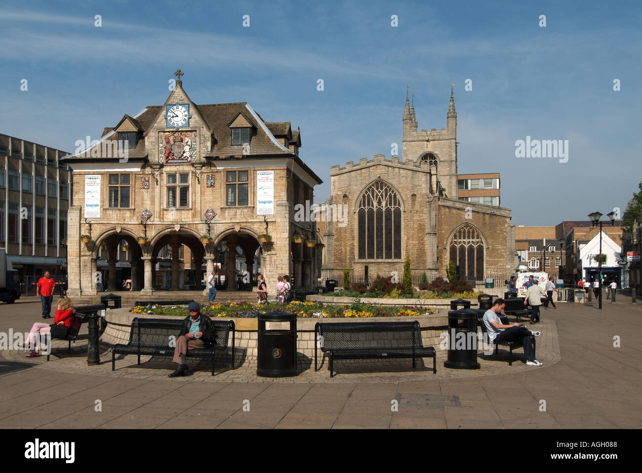 Peterborough town centre people sitting relaxing in Cathedral Square ...