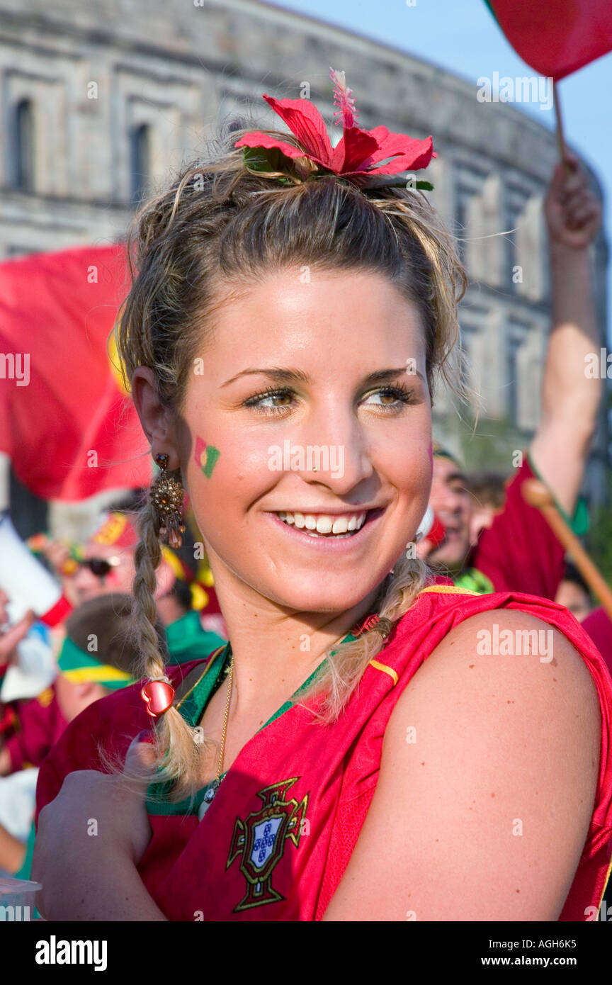 Young portugese woman smiles at soccer (football) fan fest in  Germany during the 2006 World Cup. Stock Photo