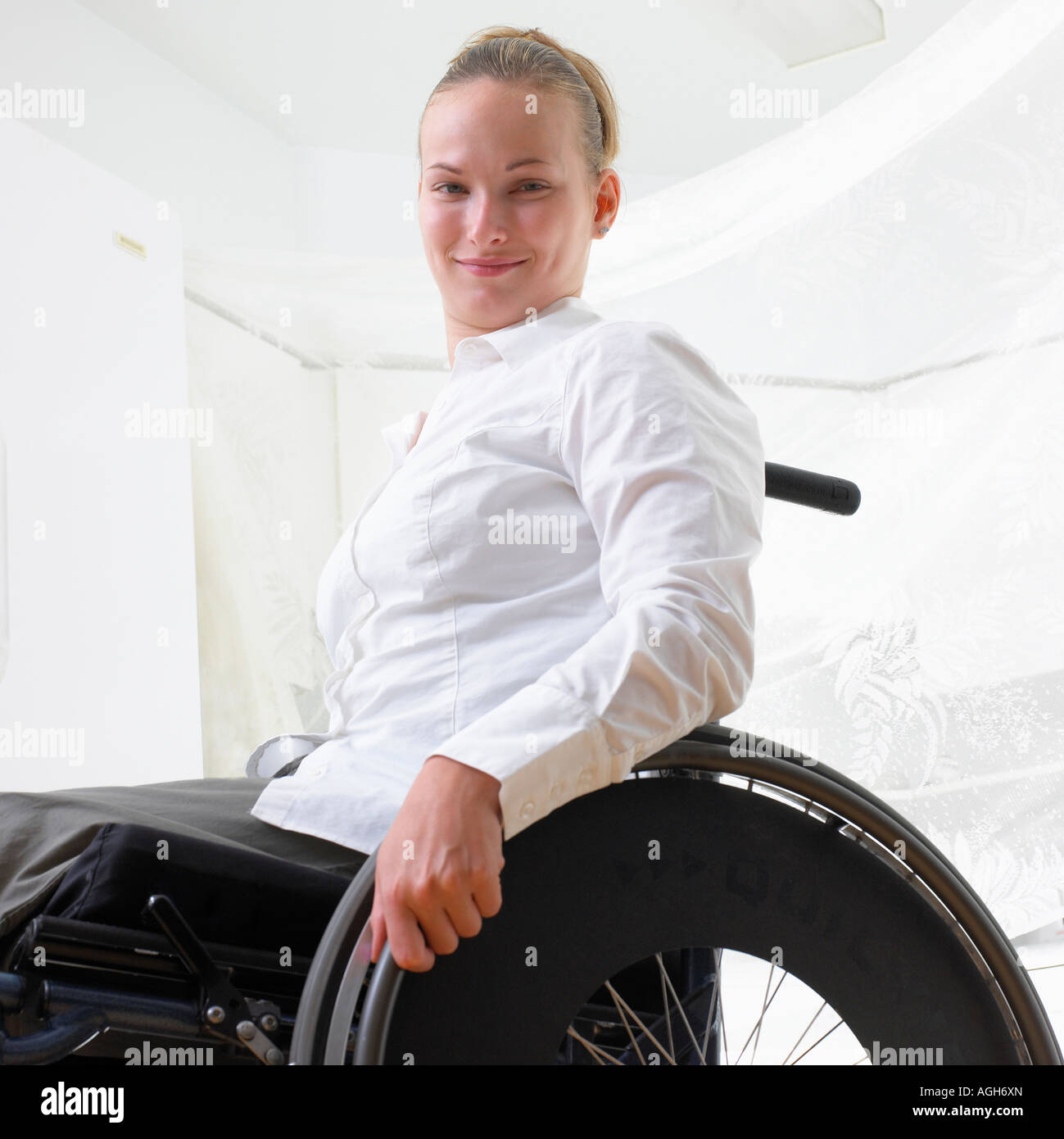 Image of disabled young woman in the wheelchair Stock Photo - Alamy