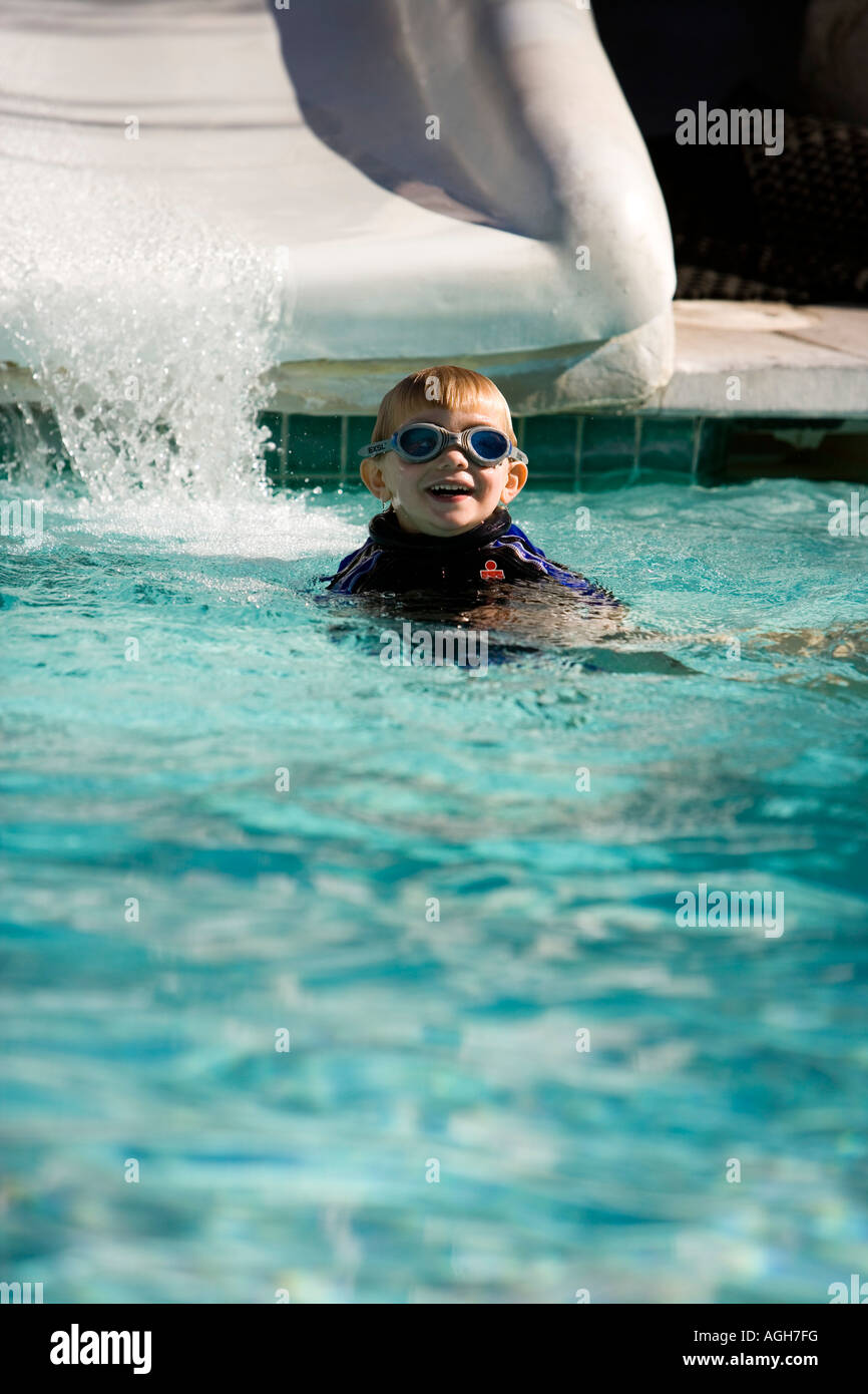 boy on a water slide palm springs california usa AGH7FG