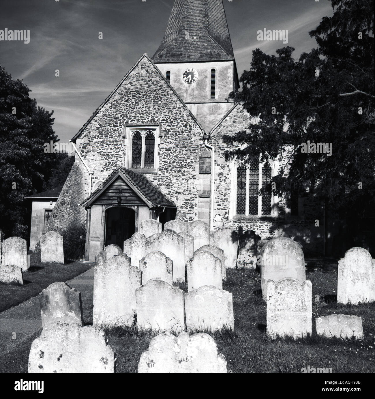 Medieval church and graveyard Stock Photo - Alamy