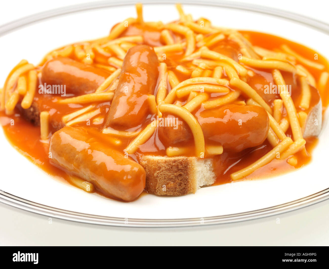 Spaghetti and Sausages on Toast Stock Photo Alamy