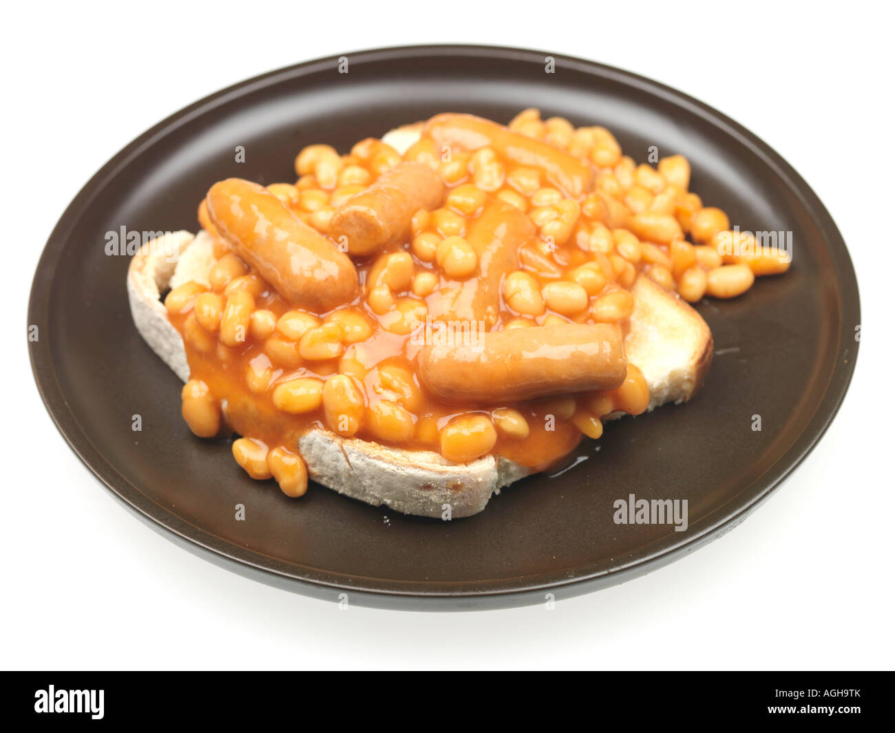 Tin Of Baked Beans In Tomato Sauce With Pork Sausages On Toast Meal