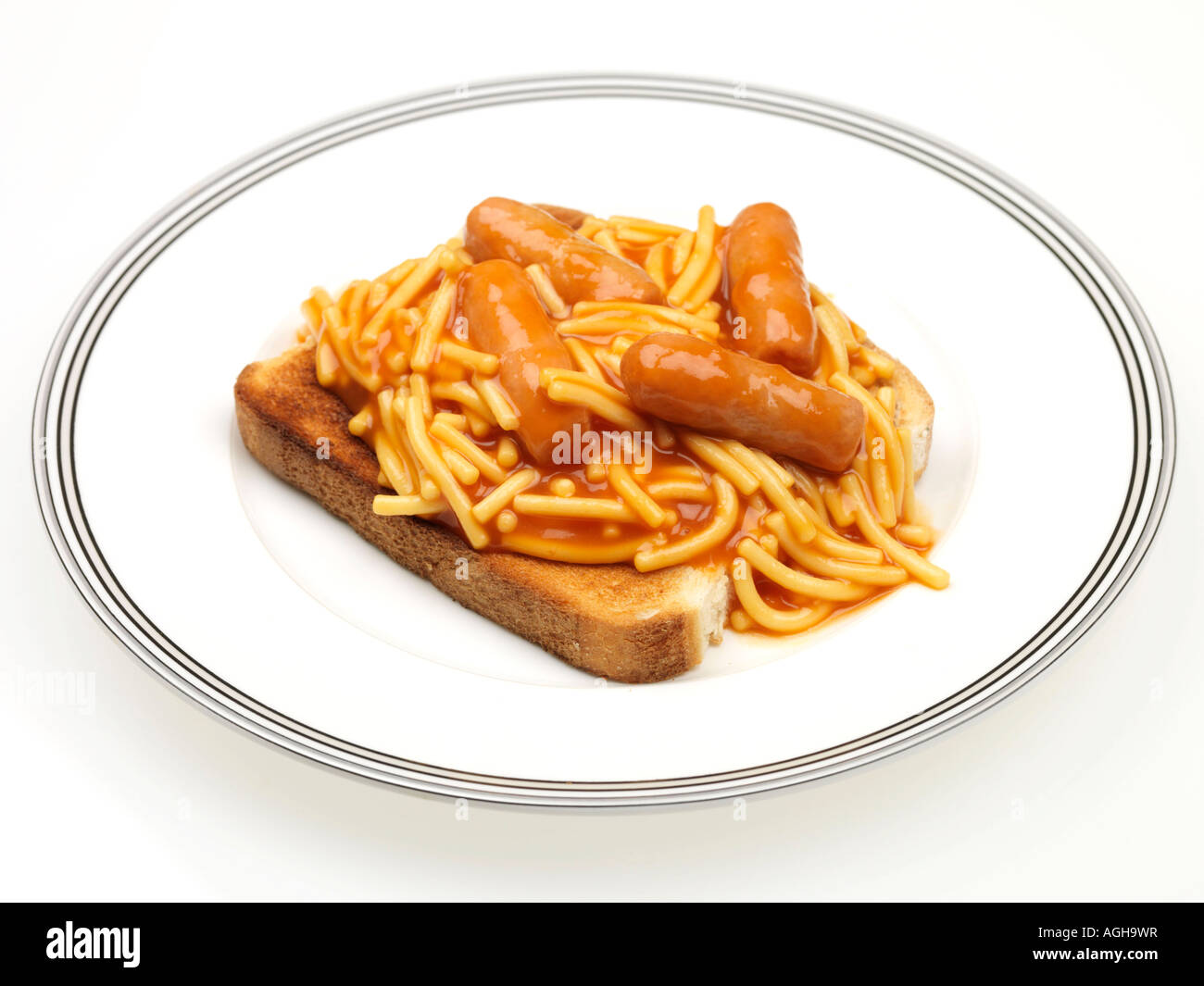 Tin Of Spaghetti Pasta In Tomato Sauce With Pork Sausages On Toast Meal