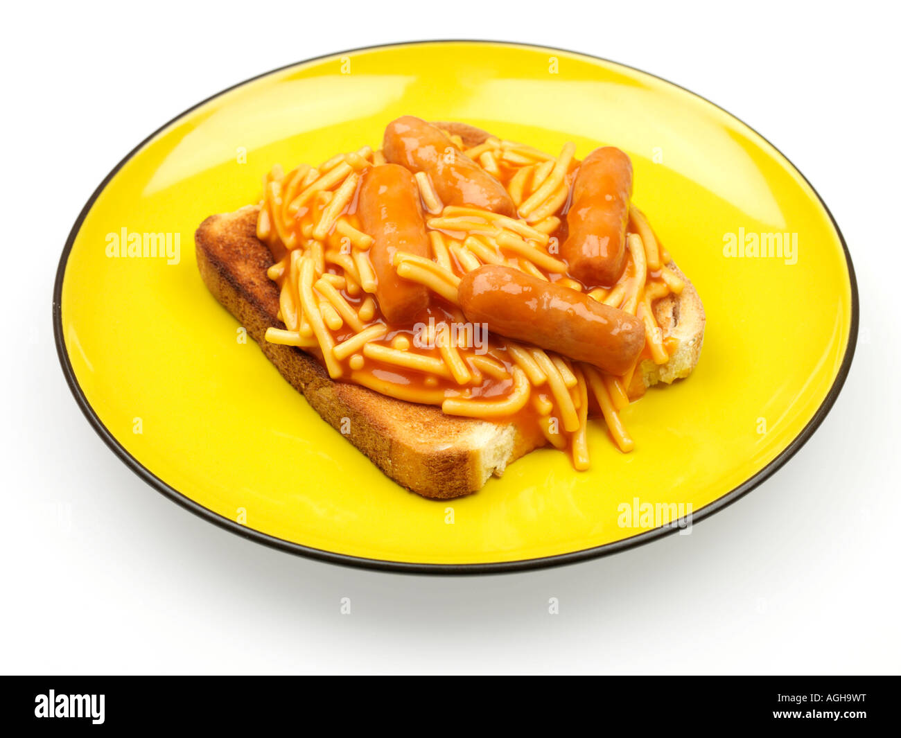 Tin Of Spaghetti Pasta In Tomato Sauce With Pork Sausages On Toast Meal