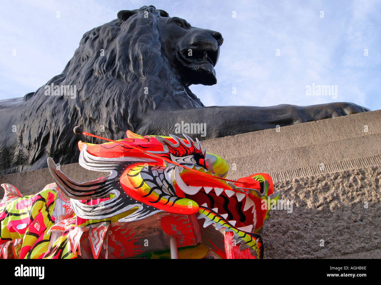Landseer Lion statue and Dragon puppet. Trafalgar Square, London, England Stock Photo
