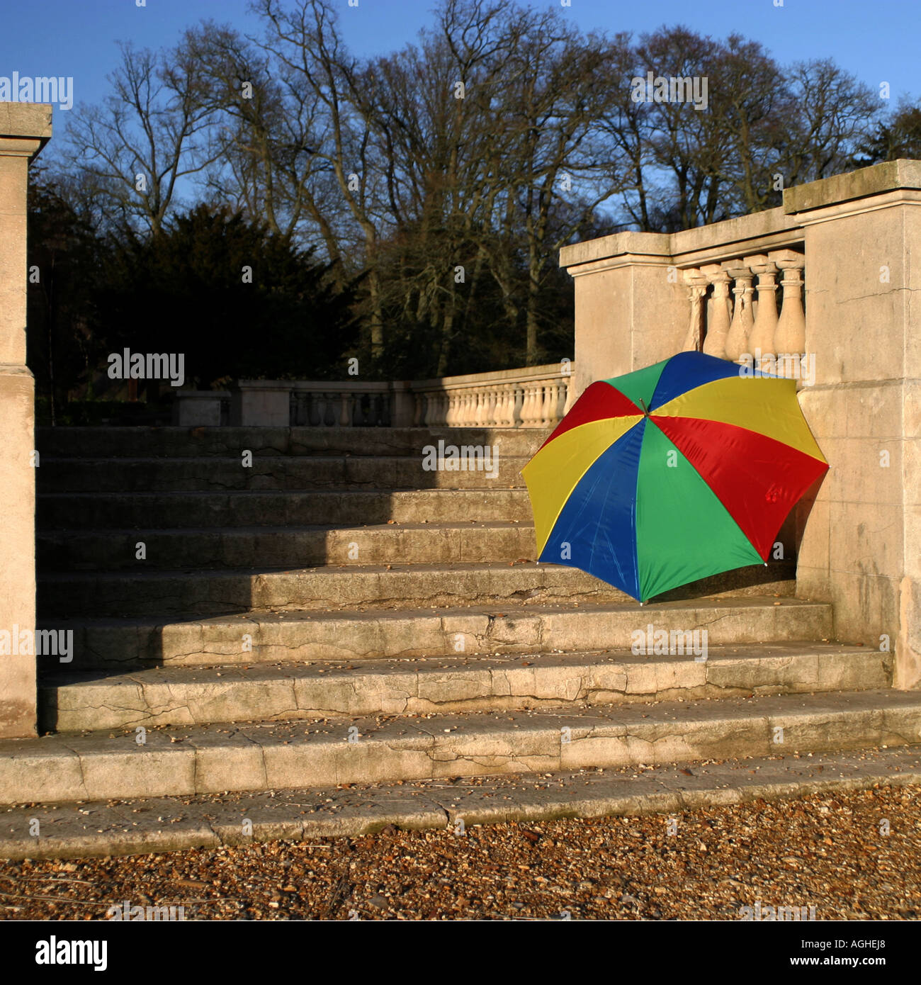 Stately Step Artistic shot of a multi coloured umbrella on the steps of a stately ...