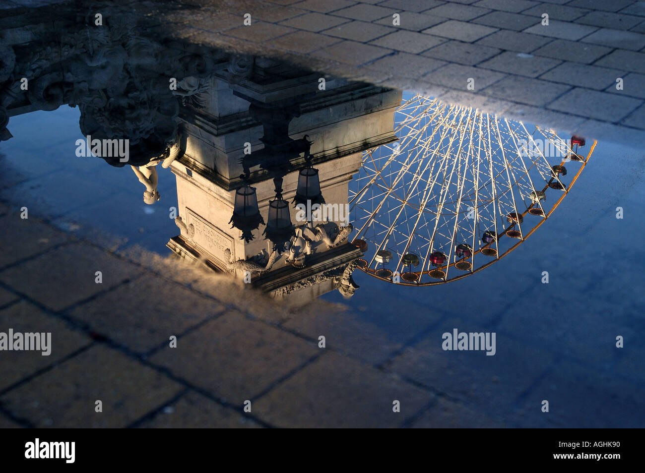 Reflection of Girondins Monument and fairground wheel Bordeaux France Stock Photo