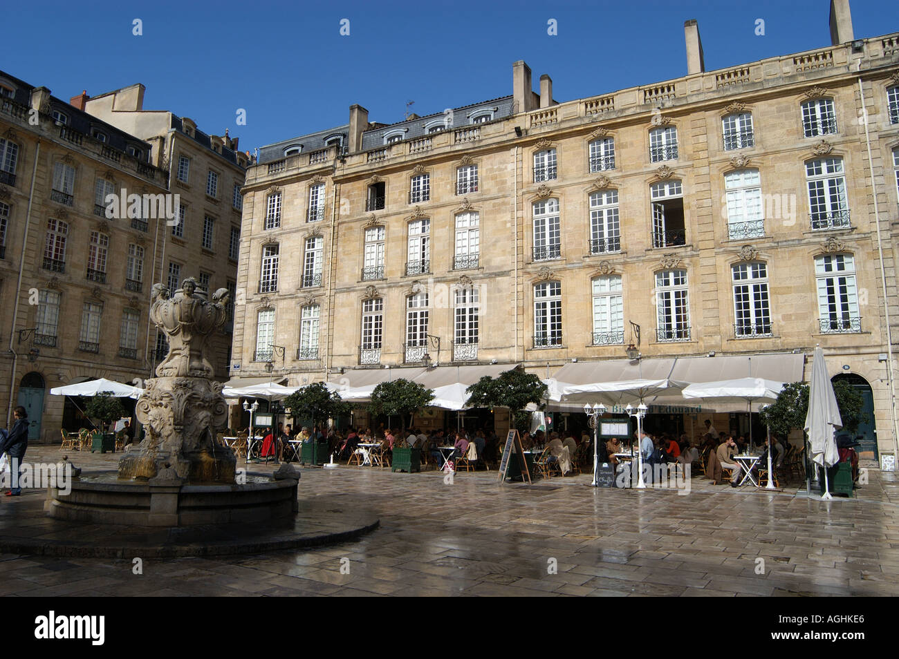 Neoclassical architecture and fountain in Place du Parliament Bordeaux France Stock Photo