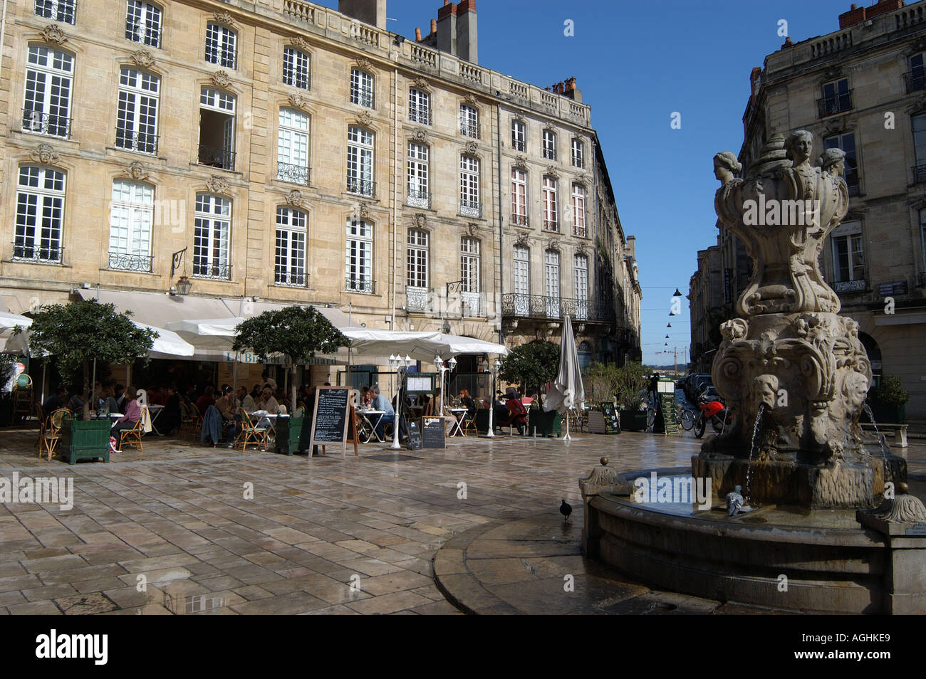 Restaurants and fountain in Place du Parliament Bordeaux France Stock Photo