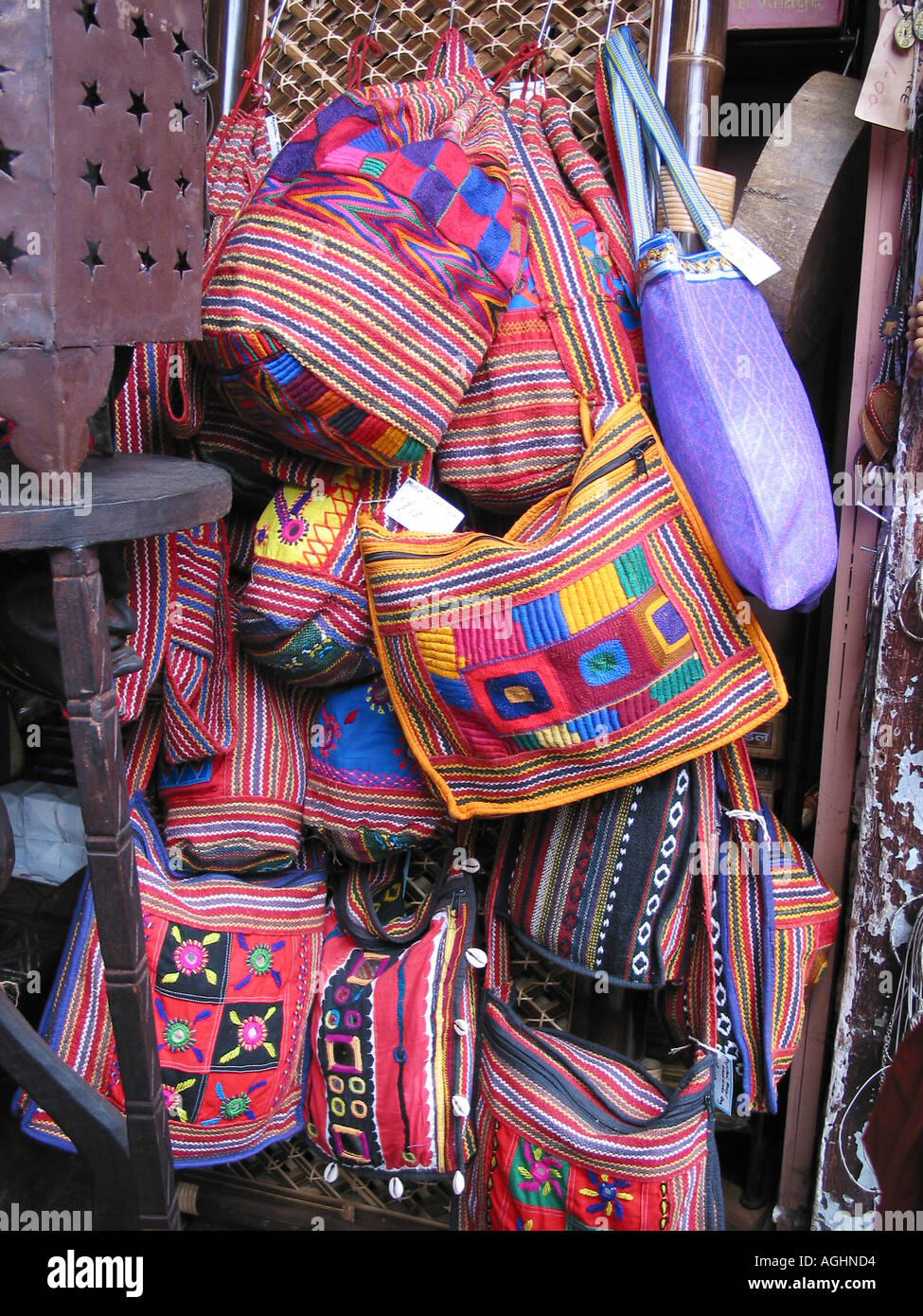 display of coloured handbags in Camden Town London England Stock Photo