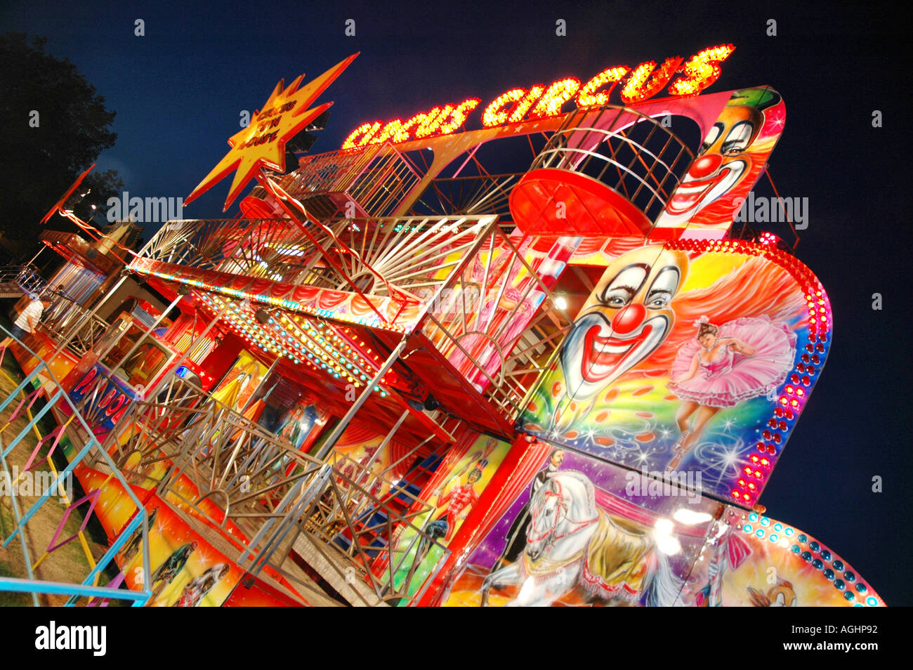 neon lights at fun fair Stock Photo Alamy
