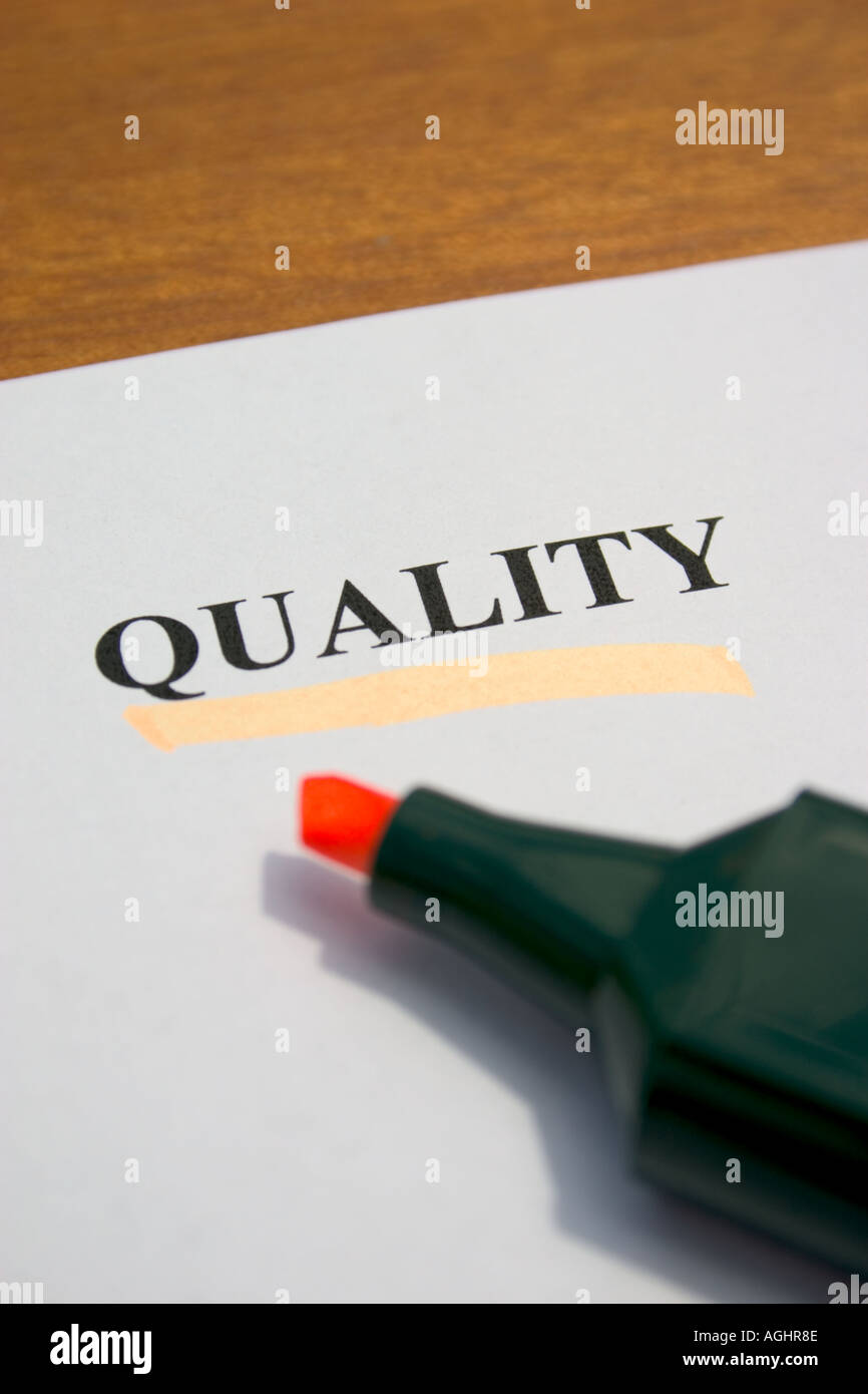 quality underlined with orange highlighter Stock Photo